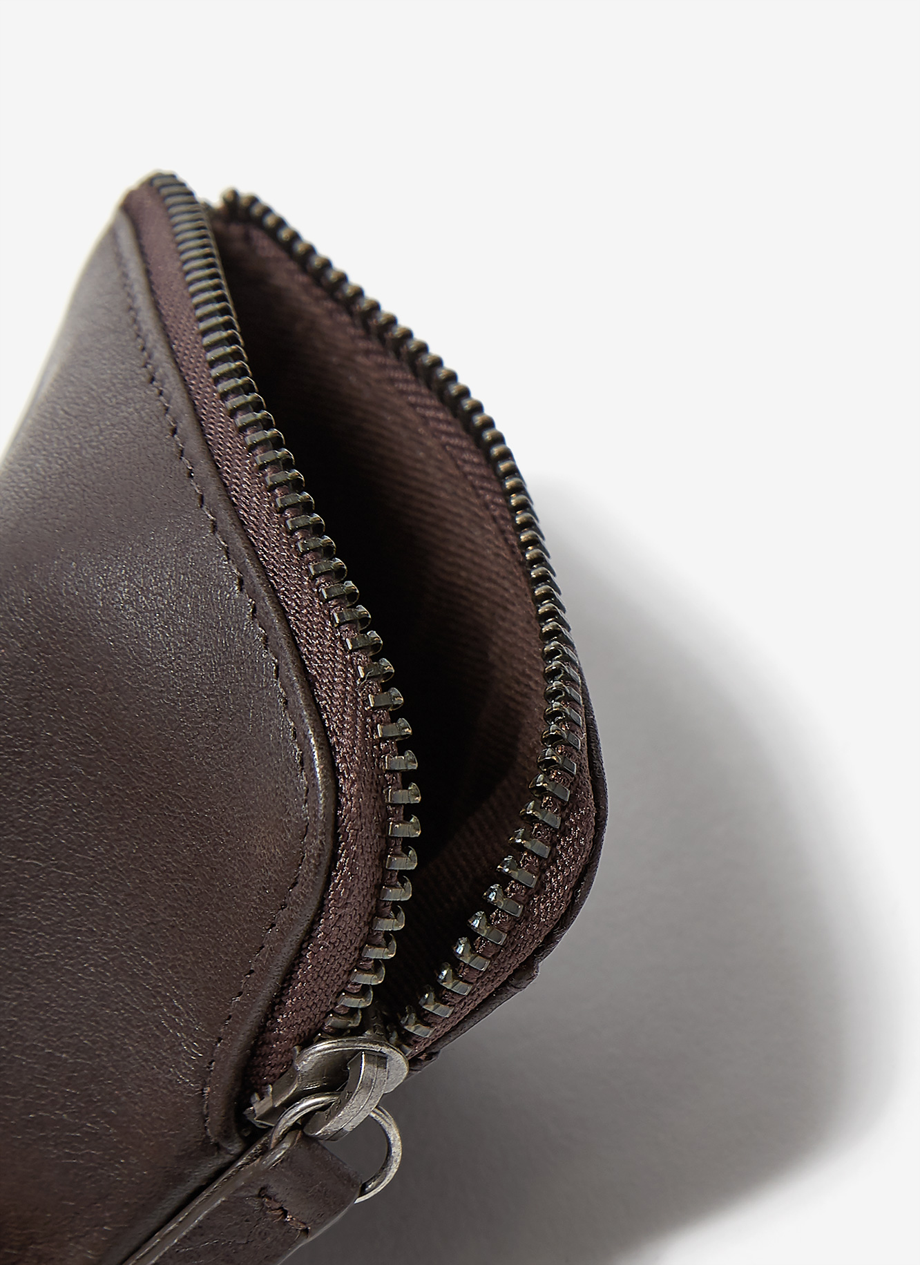 Aged leather coin holder image number 1