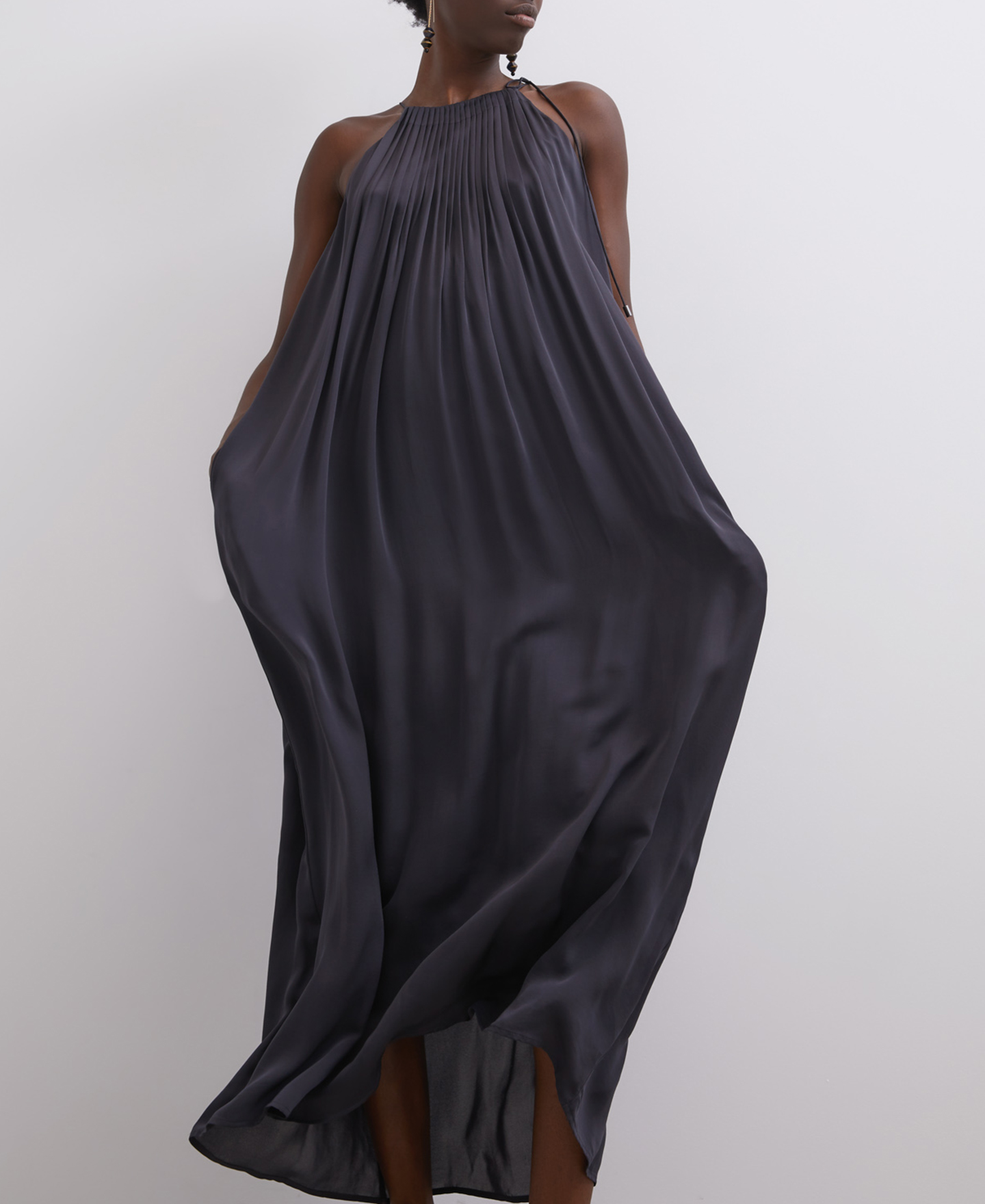 Long pleated dress with halter neckline image number 0