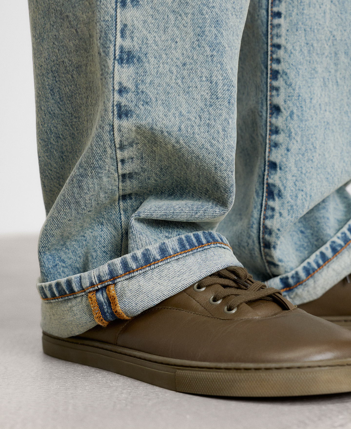 Bootcut washed-effect denim trousers image number 3