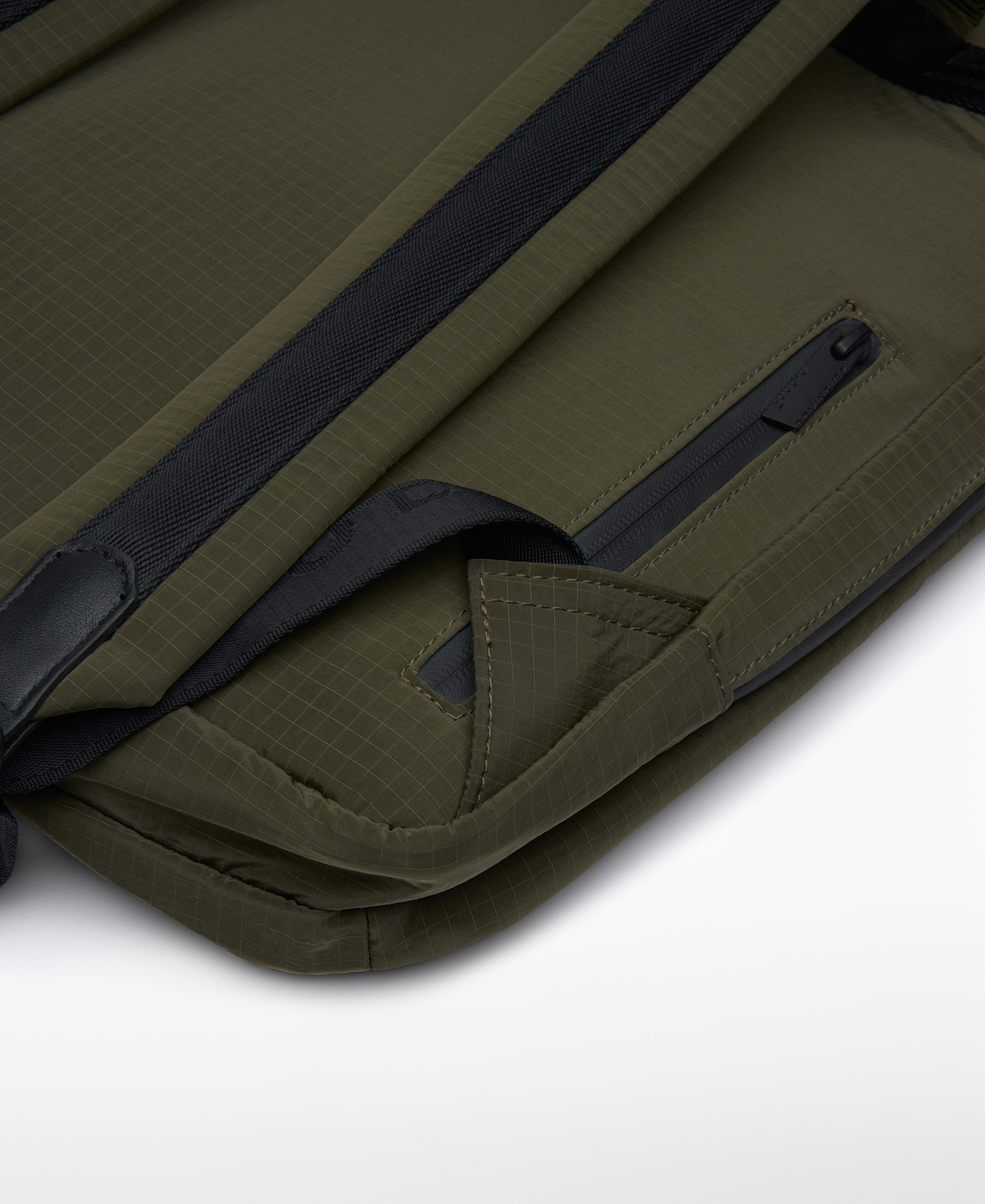 Green nylon compact backpack man image number 2