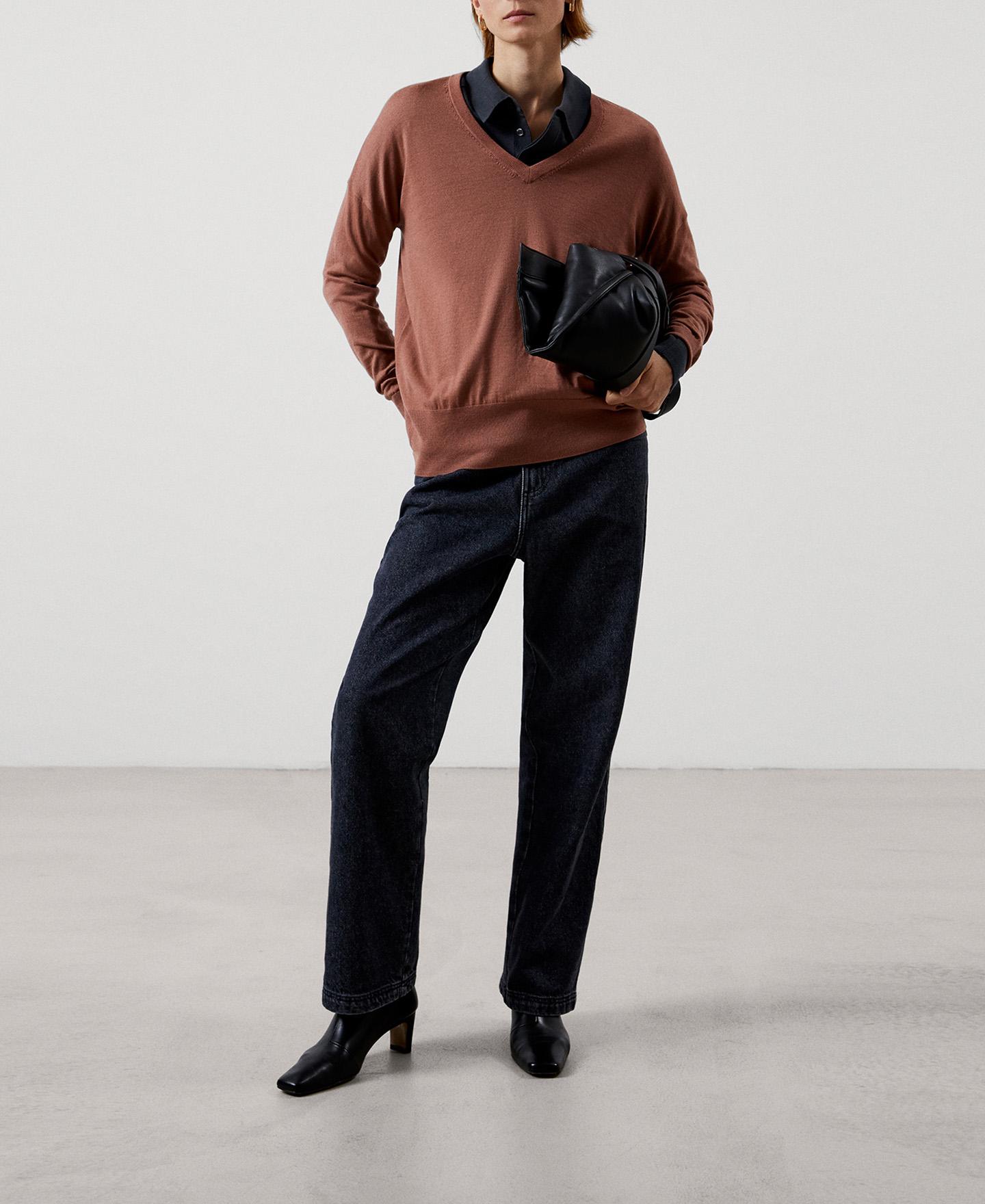 V-neckline merino wool sweater image number 1