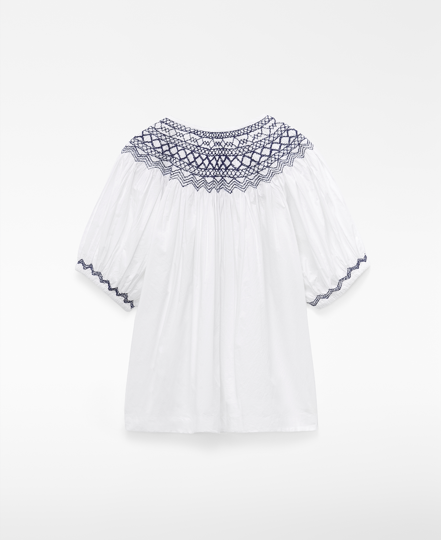 Blusa nido de abeja borlas image number 5