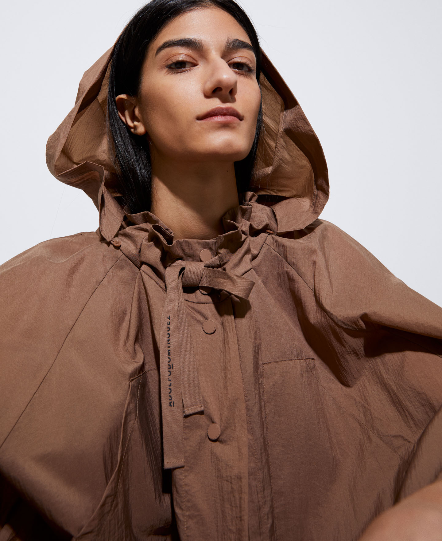 Nylon cape transformable into a skirt image number 5