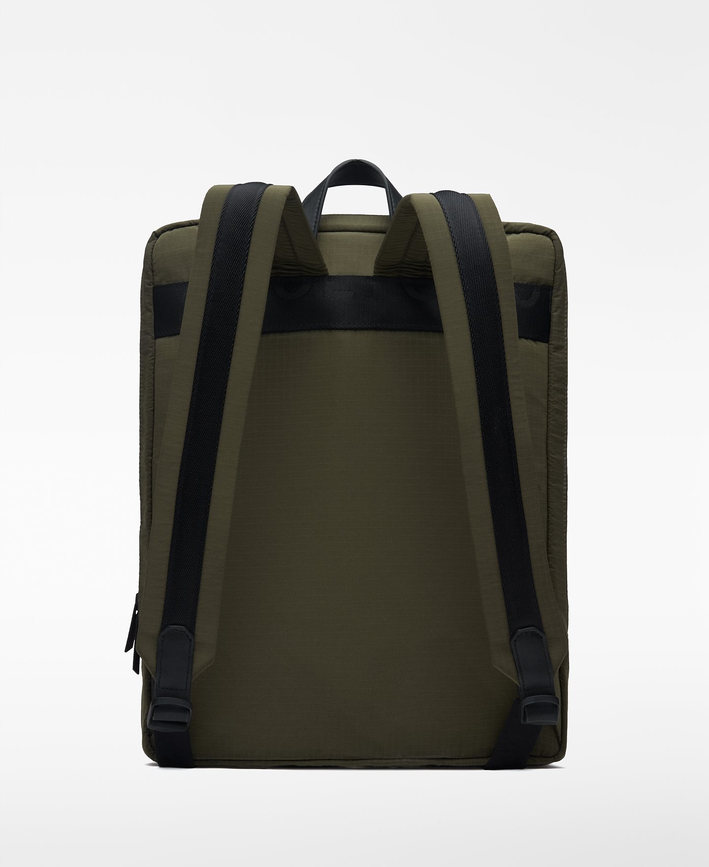 Green nylon compact backpack man image number 1
