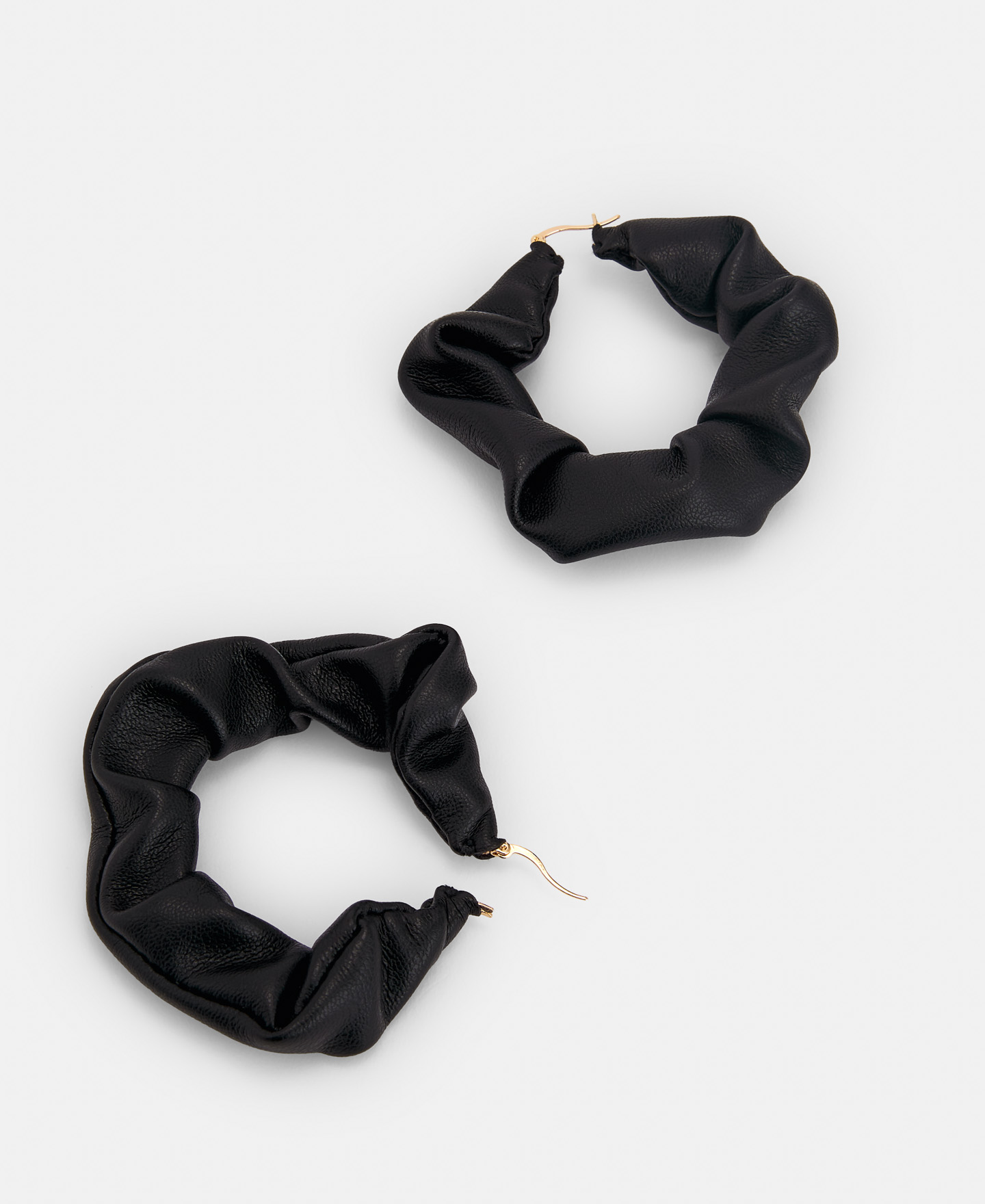 Pendientes de aro en aspecto piel image number 1